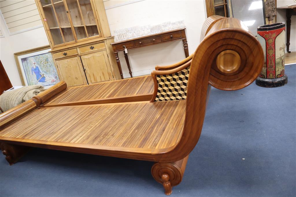 A pair of contemporary American chestnut daybeds by Mark Griffiths with inlaid cube parquetry panels, length 230cm, width 74cm, height